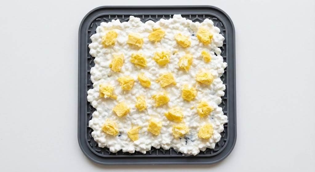 A protein-packed brunch option with low-fat cottage cheese and scrambled egg bits.